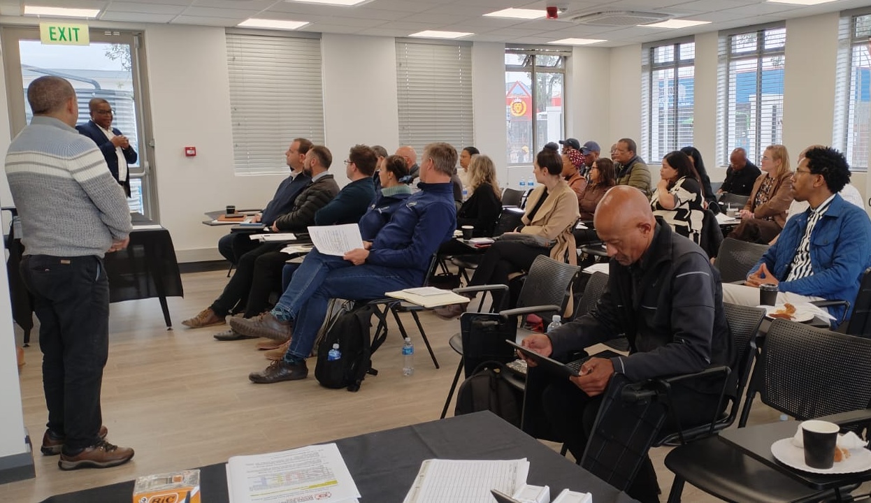 Smiling team members in an office setting